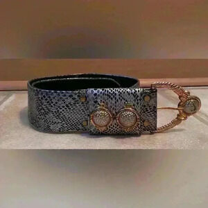 Black and white faux snakeskin belt with gold buckle and large button detail;37”